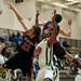 Huron junior Antonio Henry and other players reach for a rebound in the game against Pickney on Monday, March 4. Daniel Brenner I AnnArbor.com